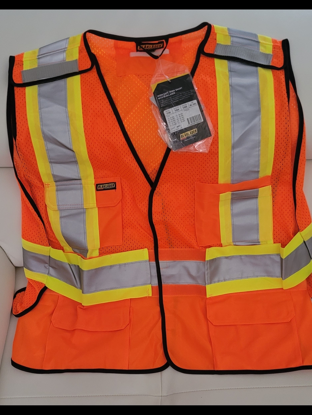 High-Visibility Orange Safety Vest with Reflective Striping